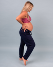 Pregnant mother wearing navy maternity bamboo jogger pants