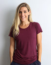 Front view of womens burgundy workout tee made in bamboo fabric